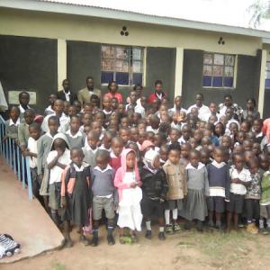 Mama Caren Pupils And Teachers Outside The Chapel 1