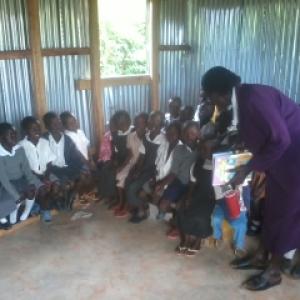 Madam Dorcas Facilitating A Discussion Inone Of The Classes